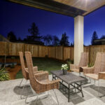 Backyard,Covered,Patio,Design,With,High,Back,Wicker,Chairs,And