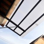 Look,Up,View,Of,A,Transparent,Awning,With,Steel,Structure